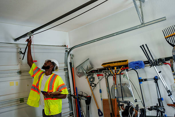 Professional Garage Door Maintenance technician working in West Brattleboro, VT
